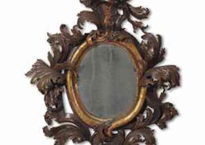 a_north_italian_brown-painted_and_parcel-gilt_mirr copy